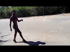 Black chick playing naked in public