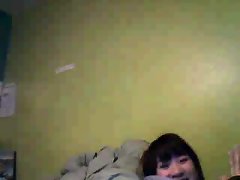 2 asian girls write a message on their soles