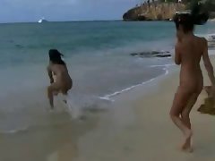 Naked teens fool around on public beach (just-drew)