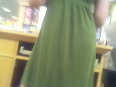 Bookstore worker in green dress
