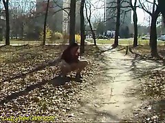 Hot slut with big tits pissing in a public park