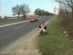 Chick pisses on the highway